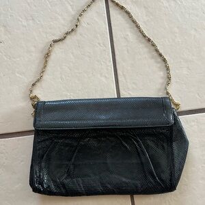 Snakeskin shoulder bag with chain strap